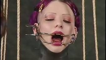 Inez gets pulled by the nipples and tongue in BDSM video