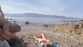 A Couple Indulges In Exhibitionism And Oral Pleasure On A Beach